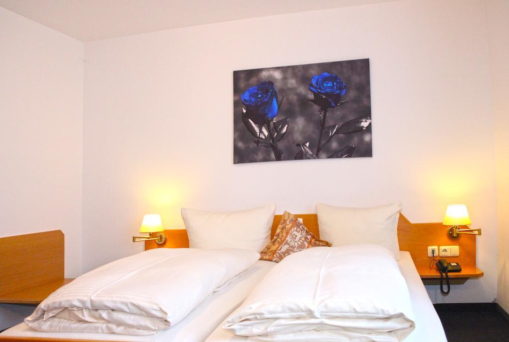 Hotel Am Ostpark Neubiberg Quarto foto